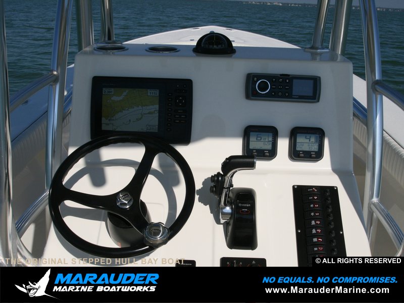 Custom marine electronics photo mounted to dash in Stepped Hull Bay Boats photo gallery from Marauder Marine Boat Works