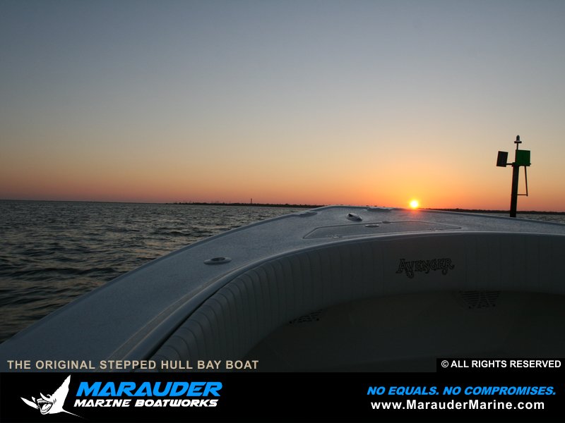 Photo of sunrise on custom bay boat headed for a trip in Stepped Hull Bay Boats photo gallery from Marauder Marine Boat Works