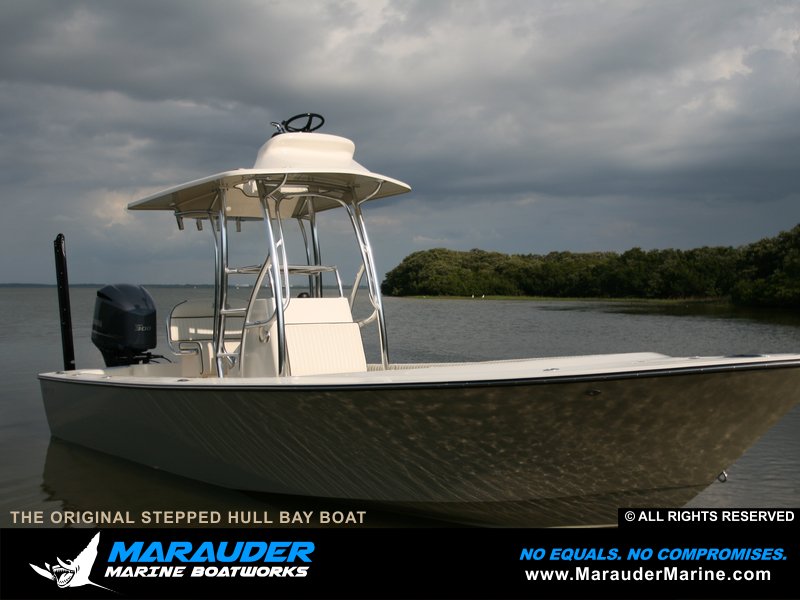 Starboard side photo of an Avenger custom fishing boat shown with tower in Stepped Hull Bay Boats photo gallery from Marauder Marine Boat Works