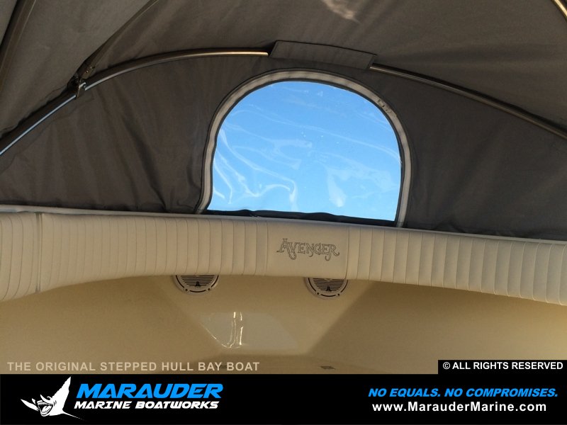 Custom front cover / tent on custom bay fishing boat in Stepped Hull Bay Boats photo gallery from Marauder Marine Boat Works