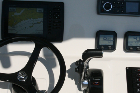 Custom marine electronics photo mounted to dash