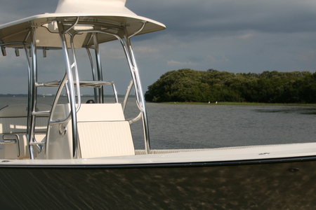 Starboard side photo of an Avenger custom fishing boat shown with tower